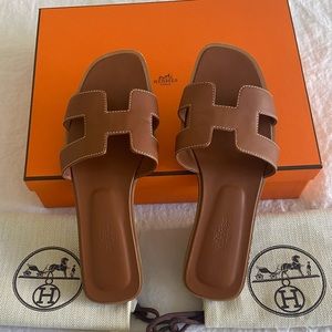 Hermes Oran 36.5 sandals, color “Gold.” Excellent used condition.